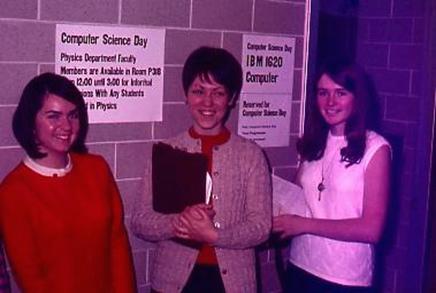 Three visitors prepare to use the IBM 1620 during one UW’s Computer Science Days